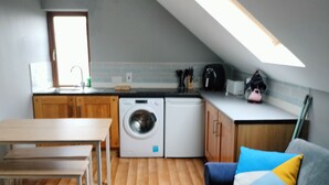 Fridge, stovetop, electric kettle, toaster
