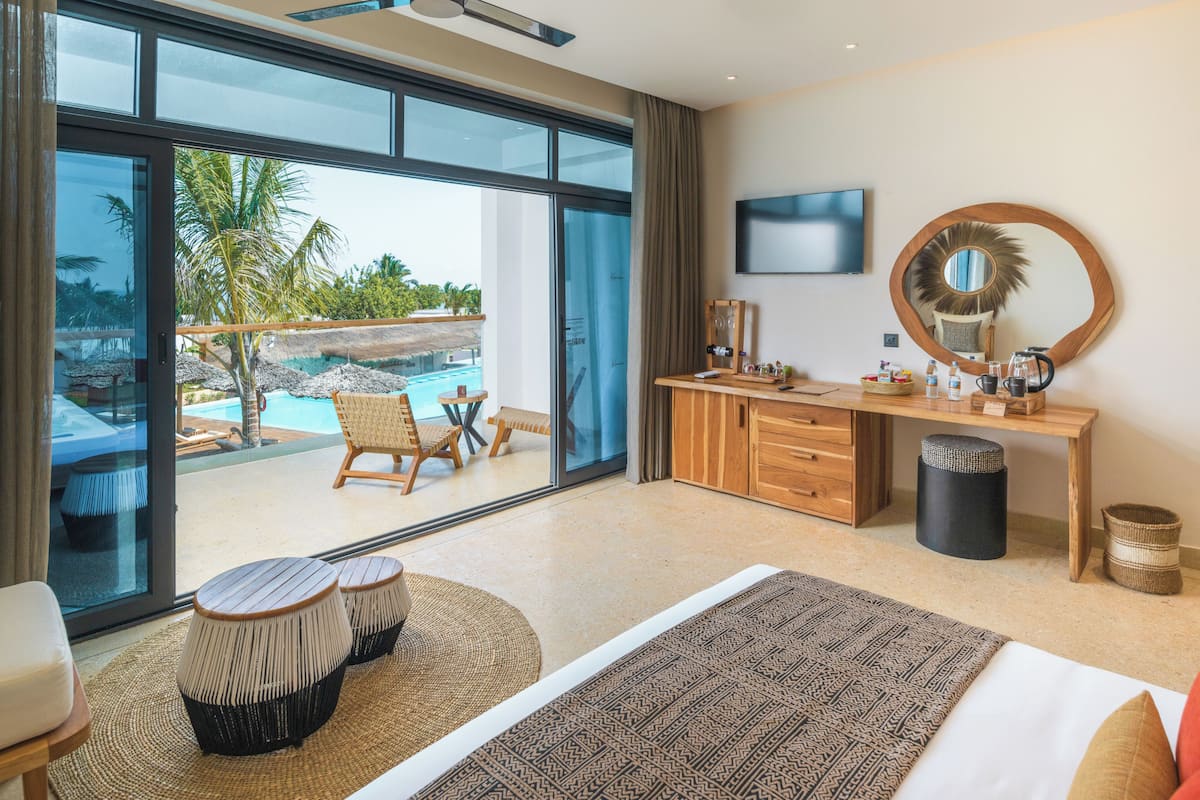 Deluxe Jacuzzi Room | Ropa de cama de alta calidad, minibar, caja fuerte y escritorio