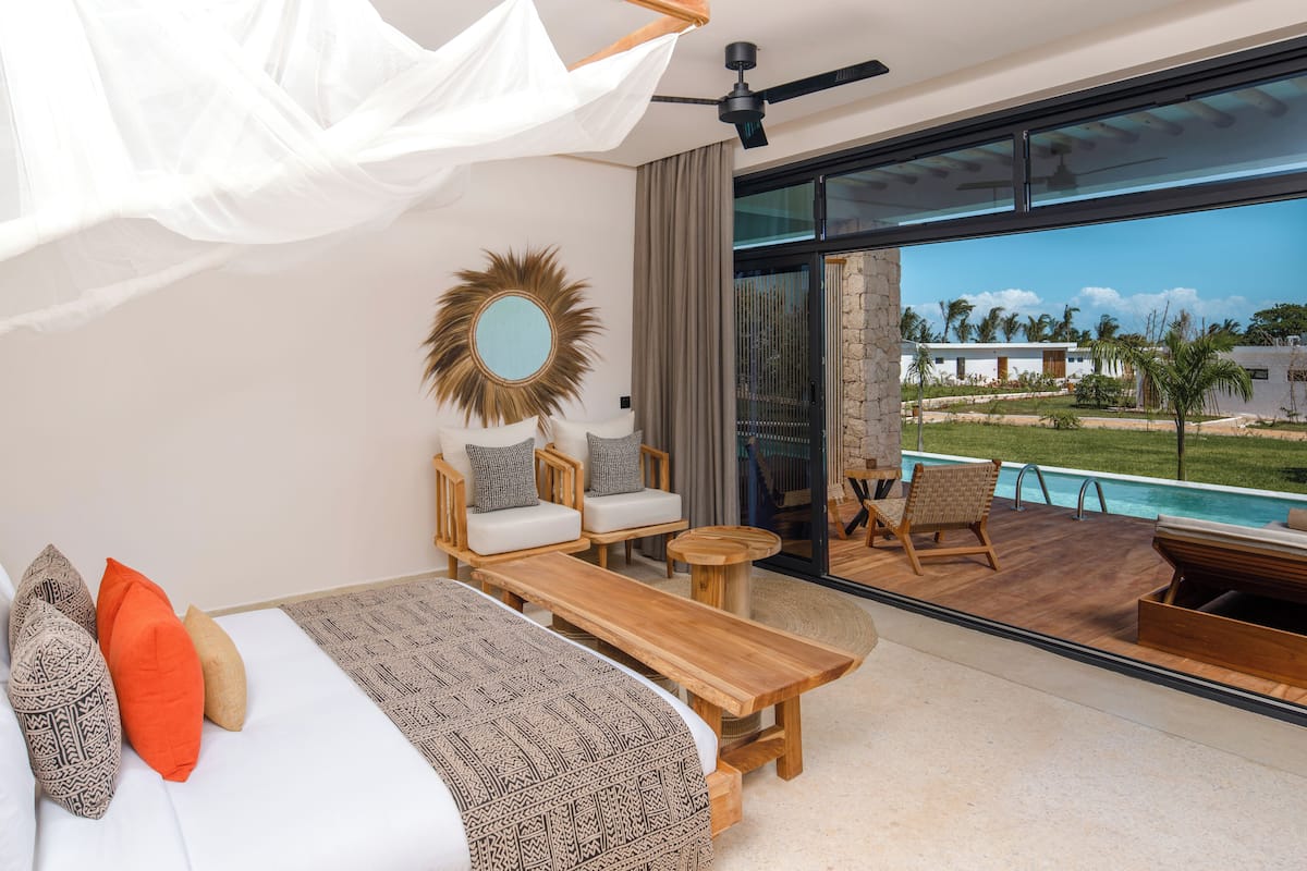 Habitación Deluxe | Ropa de cama de alta calidad, minibar, caja fuerte y escritorio