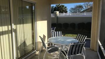 Villa, Multiple Beds, Lanai, Garden View | Outdoor dining