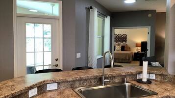 House, Multiple Beds, Lanai, Garden View | Private kitchen | Fridge, microwave, oven, stovetop