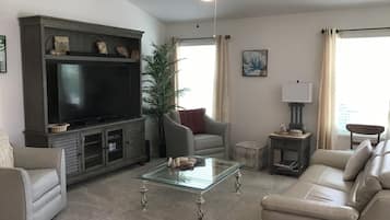 Villa, Multiple Beds, Patio, Garden View | Living area | TV