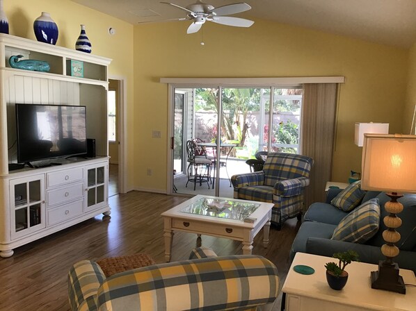 Villa, Multiple Beds, Lanai, Garden View | Living area | TV - 2594 Lindewood St (Wildwood)