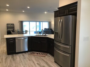 House, Multiple Beds, Lanai, Garden View | Private kitchen | Fridge, microwave, oven, stovetop