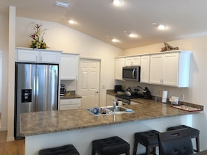 Villa, Multiple Beds, Lanai, Garden View | Private kitchen | Fridge, microwave, oven, stovetop