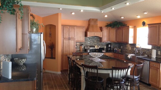 Villa, Multiple Beds, Lanai, Garden View | Private kitchen | Coffee/tea maker, fridge, oven, stovetop - 1421 Ulmer Ter (The Villages)