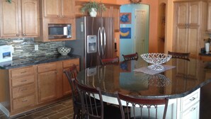 Villa, Multiple Beds, Lanai, Garden View | Private kitchen | Coffee/tea maker, fridge, oven, stovetop - 1421 Ulmer Ter (The Villages)