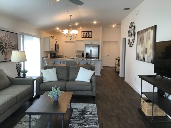 Villa, Multiple Beds, Lanai, Garden View | Living area | TV - 1959 Stenerson St (Wildwood)