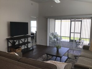 Villa, Multiple Beds, Lanai, Garden View | Living area | TV