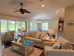 House, Multiple Beds, Lanai, Golf View | Living area | TV, fireplace - 1468 Tidewater Ter (The Villages)