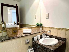 Hair dryer, bidet, towels, soap