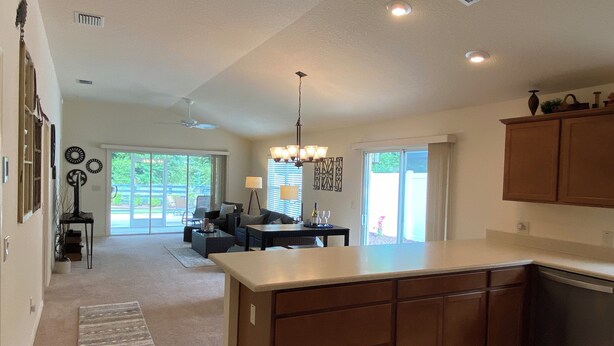 Villa, Multiple Beds, Lanai, Garden View | Private kitchen | Coffee/tea maker, fridge, microwave, oven - 3018 Orourke Rd (Fruitland Park)