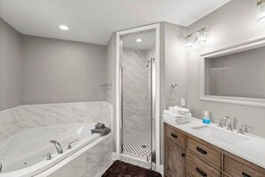 Bathtub, towels, shampoo