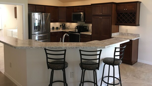 Casa, várias camas, varanda coberta, vista para o jardim | Cozinha privada | Cafeteira/chaleira, geladeira, micro-ondas, fogão
