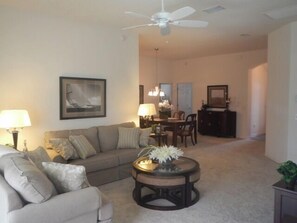 House, Multiple Beds, Lanai, Garden View | Living area | TV