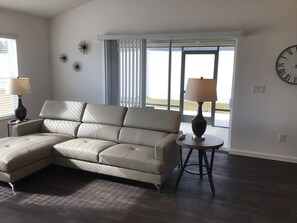 Villa, Multiple Beds, Kitchen, Garden View | Living area | TV
