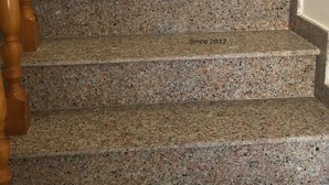 A staircase with granite steps and wooden handrails. - Apartment with sea view terrace in Salento (Castro)