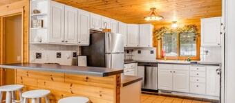 Lakefront, dog-friendly home with dock, kayaks, deck, & washer/dryer