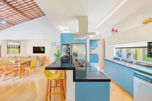 Chalet | Private kitchen | Coffee/tea maker, full-size fridge, microwave, cookware/dishes/utensils