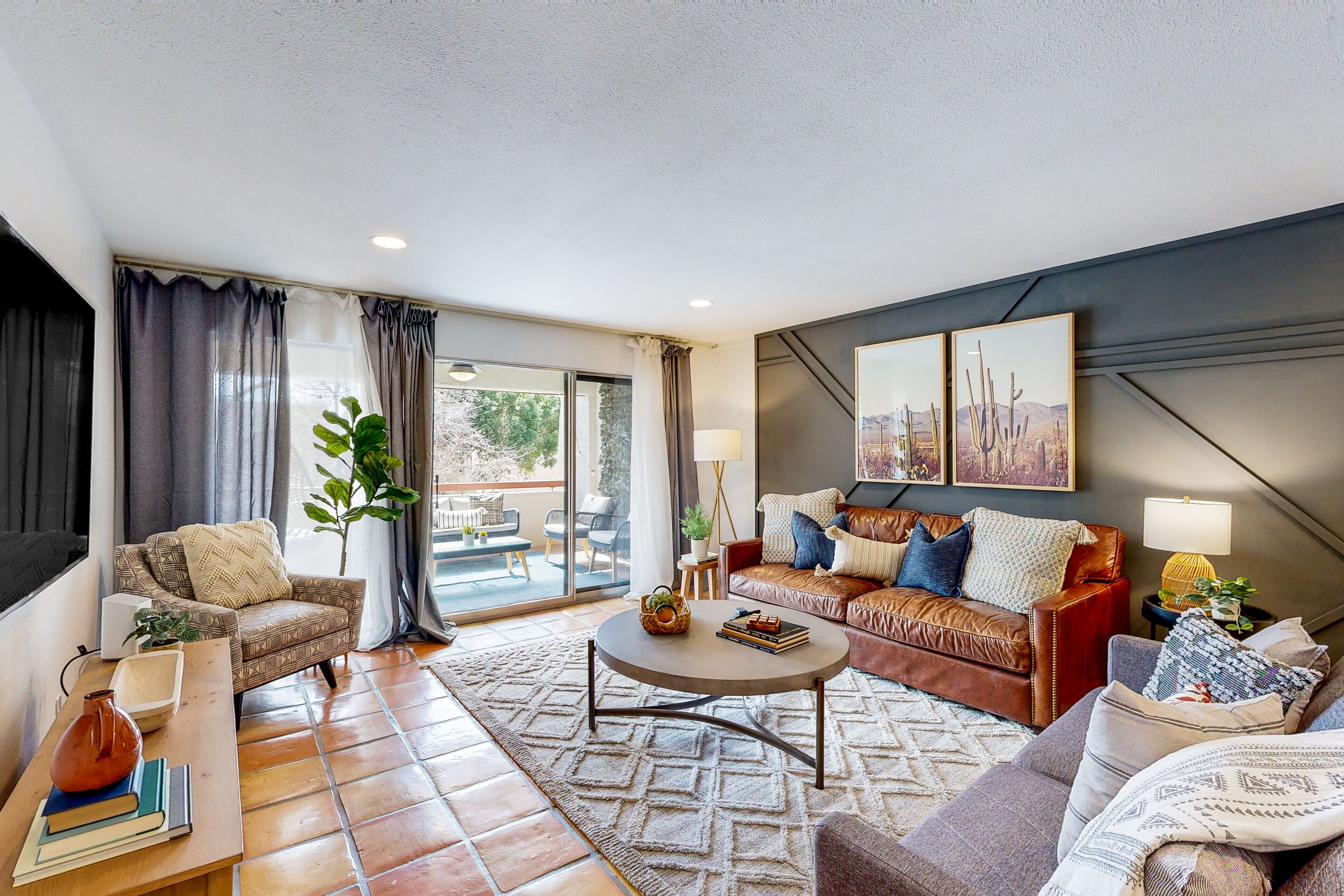 Renovated condo with modern fixtures, sun-lit balcony - pool, spa, & gym access