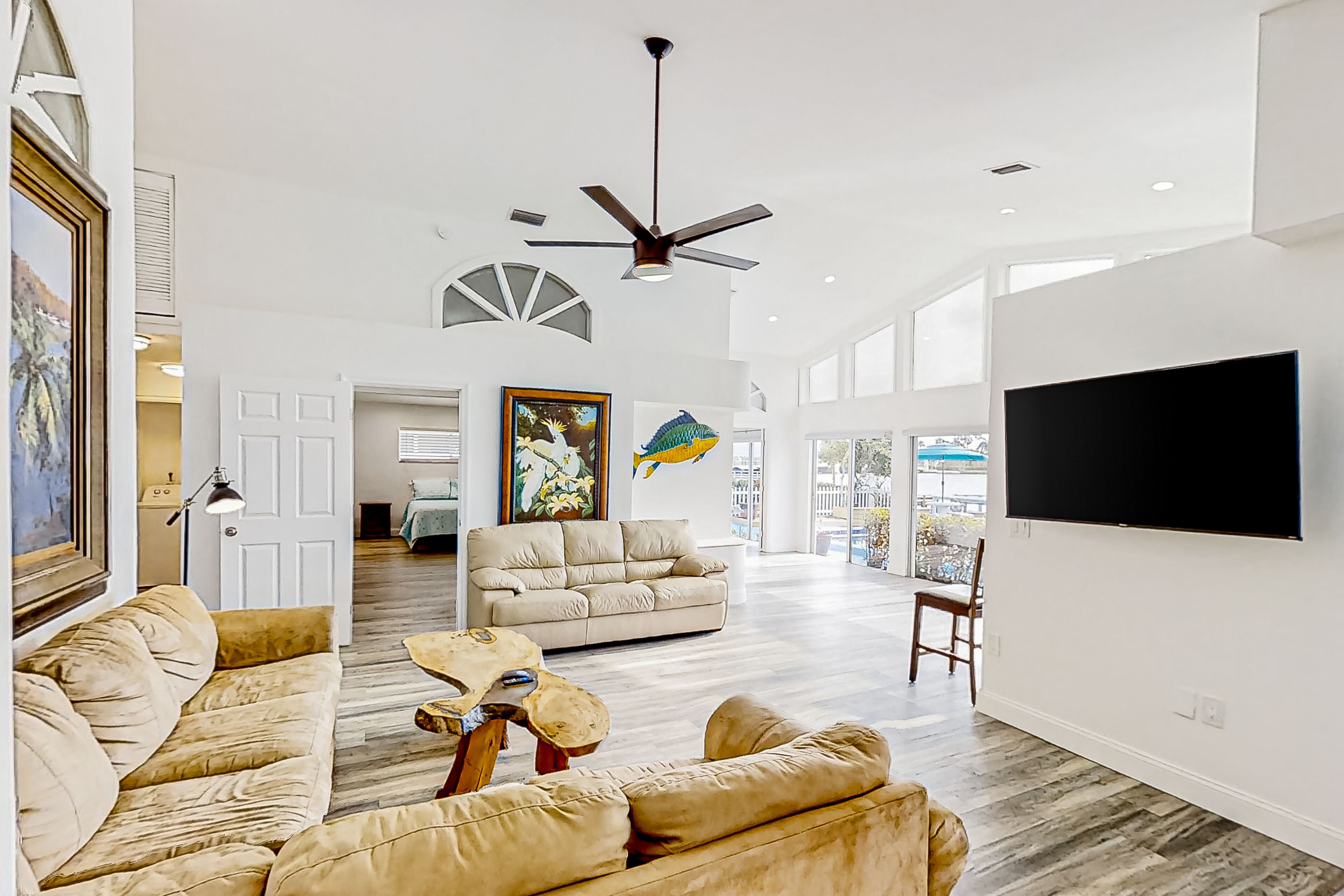 Bayfront home with shared pool, grill, dock, washer/dryer, streaming, & AC