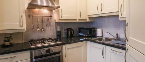 Fridge, dishwasher, cookware/dishes/utensils