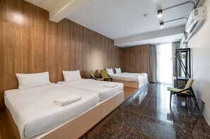 A hotel room with three beds, a wooden wall, a marble floor, and a window with curtains. - Sclass Townhome, 5 min from Night Market old city (.)