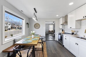 Fridge, microwave, oven, stovetop - Cozy 4Bd Bungalow w/ Private Backyard Lounge and Game Room Mins to Downtown (Raleigh)