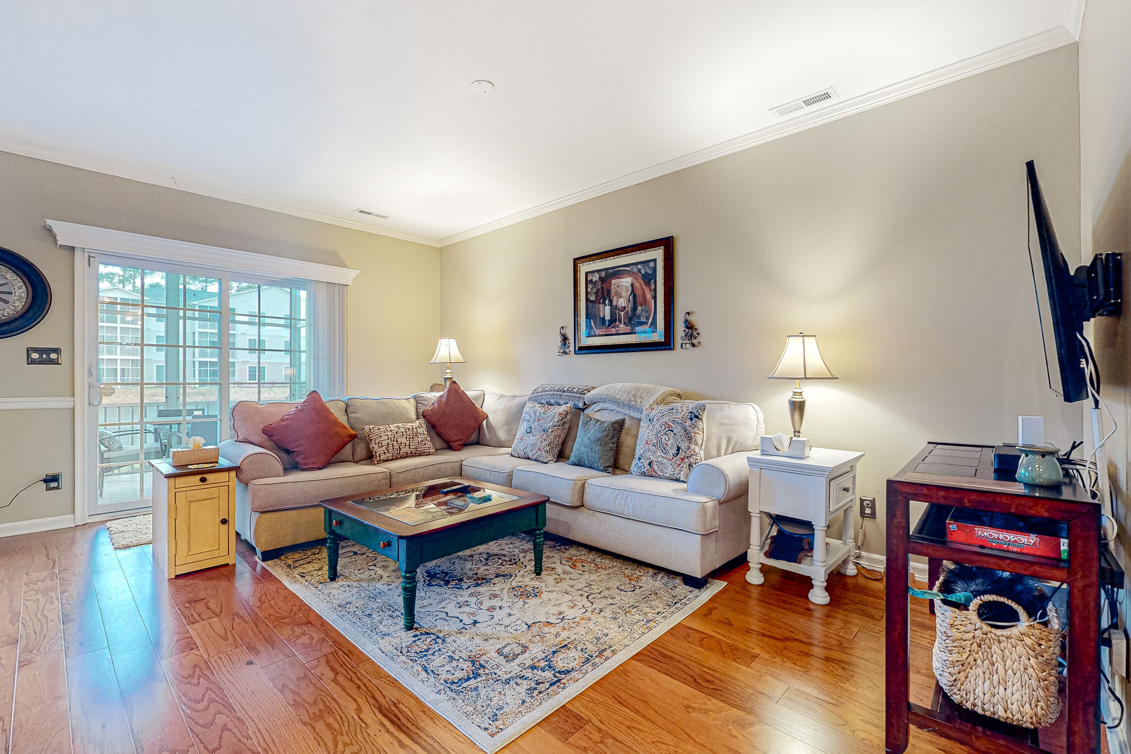 The Tides townhome with pond-front balcony, screened patio, & pool - dogs OK