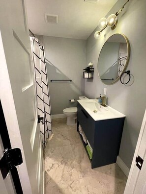 Hair dryer, towels, soap, toilet paper
