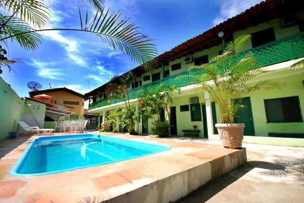 Outdoor pool, open 8:00 AM to 8:00 PM, pool umbrellas, pool loungers