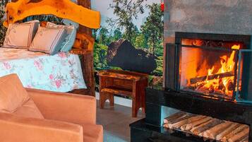 Premium Chalet | Living area | 42-inch Smart TV with satellite channels, TV, fireplace