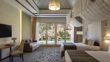 Palm Garden Villa | Minibar, in-room safe, individually decorated, individually furnished