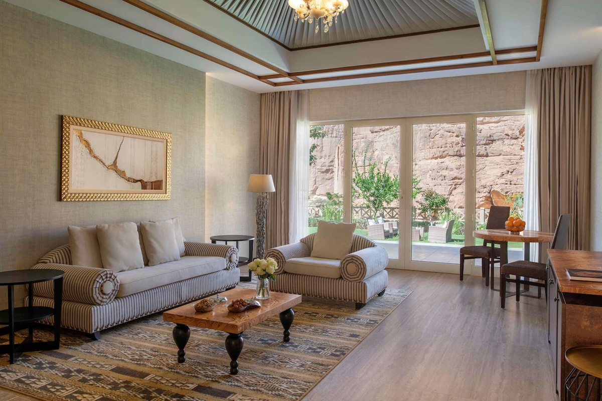 Palm Garden Villa | Living area | 50-inch flat-screen TV with digital channels, fireplace