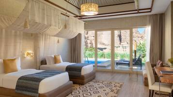 Oasis Pool Villa | Minibar, in-room safe, individually decorated, individually furnished
