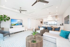 Condo, Multiple Beds, Pool Access, Ocean View (#306) | Living area | TV - Rum Point Club #306 (North Side)
