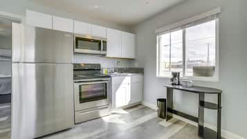 Fridge, microwave, stovetop, coffee/tea maker