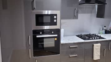 Apartment | Private kitchen | Fridge, microwave, oven, stovetop