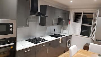 Apartment | Private kitchen | Fridge, microwave, oven, stovetop