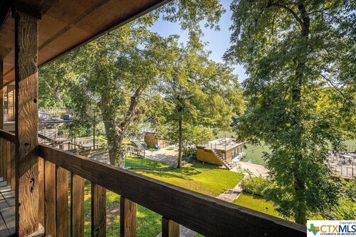 Lake McQueeney Waterfront Home: Boat Dock & Kayaks