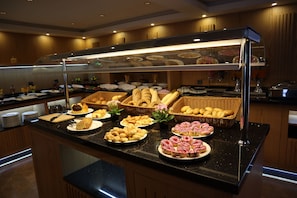 A buffet with various baked goods and pastries. - Days Inn by Wyndham Istanbul Arnavutkoy (Arnavutköy)