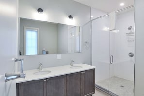 Bathtub, hair dryer, towels, soap