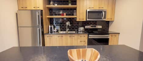 Fridge, microwave, stovetop, coffee/tea maker