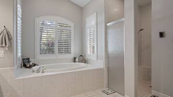 Shower, jetted tub, towels, soap