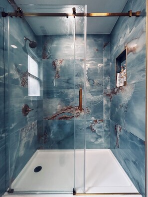 Hair dryer, towels, soap, shampoo