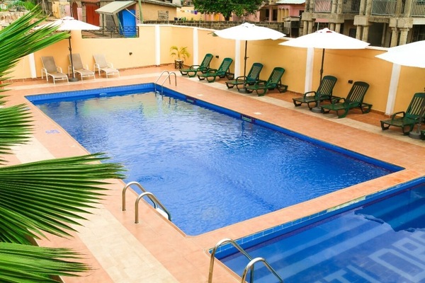 Outdoor pool, open 9:00 AM to 11:00 PM, pool umbrellas, sun loungers