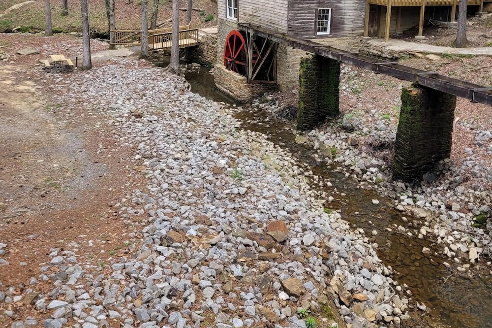 Historic Cabin in a natural setting with waterfalls and covered bridge