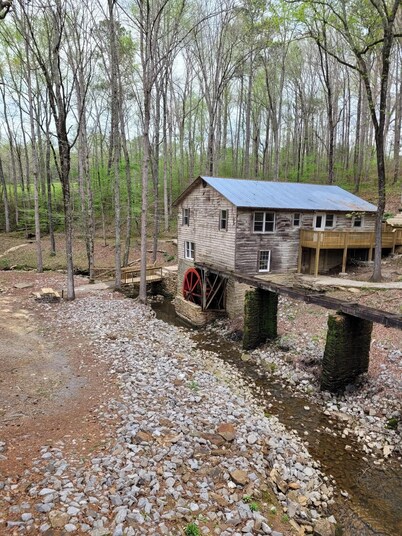 Historic Cabin in a natural setting with waterfalls and covered bridge