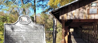 Historic Cabin in a natural setting with waterfalls and covered bridge