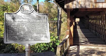 Historic Cabin in a natural setting with waterfalls and covered bridge